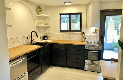 Gulfport House | Beautifully remodeled Gulfport retreat, walk to local beach in 12 mins.