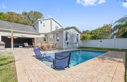 Palm Harbor House | Best-Priced Palm Harbor Retreat | Heated Saltwater Pool, Games & Beach Gear Included