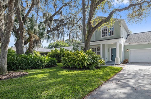 Palm Harbor House | Best-Priced Palm Harbor Retreat | Heated Saltwater Pool, Games & Beach Gear Included