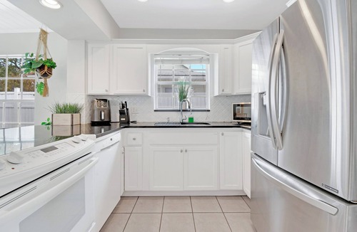 Virginia Park House | Boho TPA Escape: BIg Outdoor TV, Fire Pit, Games, and Hot tub coming soon!