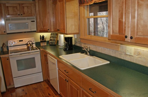 Seven Devils Cabin | Book your Summer getaway now! Firepit. Pond view.