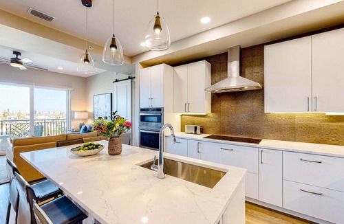Madeira Beach Condo | Brand new condo steps to beach with balcony heated pool and hot tub dog friendly