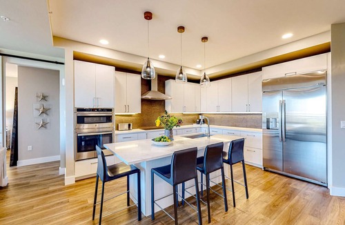 Madeira Beach Condo | Brand new condo steps to beach with balcony heated pool and hot tub dog friendly