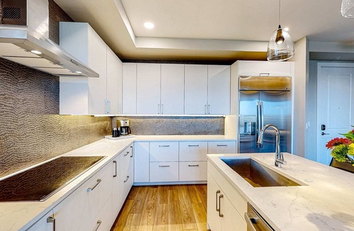 Madeira Beach Condo | Brand new condo steps to beach with balcony heated pool and hot tub dog friendly