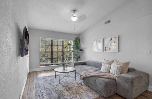 Survey Creek Apartment | Bright 2 BR FLL Gem with Balcony and Free Parking
