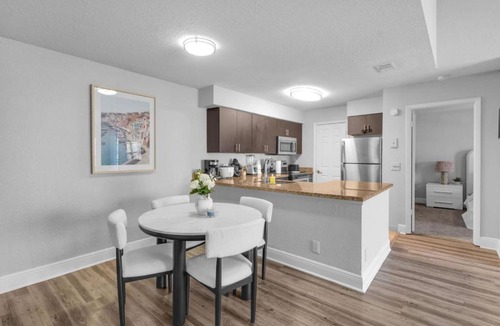 Survey Creek Apartment | Bright 2 BR FLL Gem with Balcony and Free Parking