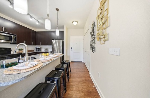 Courier City - Oscawana Apartment | Bright 2BR/2BA Tampa Haven: Productivity & Relaxation