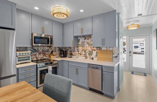 Holmes Beach Villa | Canal-Front Home with Dock and Walk to Beach