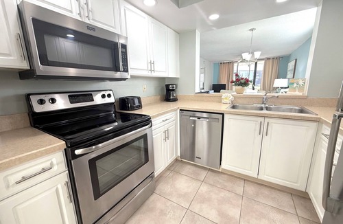 Trailer Estates Condo | *Casa Bella* Waterfront View! 2BR, w/2 Pools, Mins to IMG/Beach/Anna Maria Isl