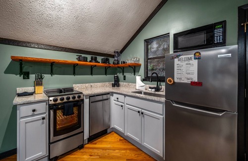 Sevierville Cabin | Charming Cozy Studio Cabin for 2-Hot Tub-Pets