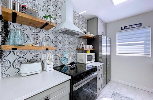 Holmes Beach Cottage | Charming Ground Level Resort Style 3 units Condo of a TRIPLEX- unit A