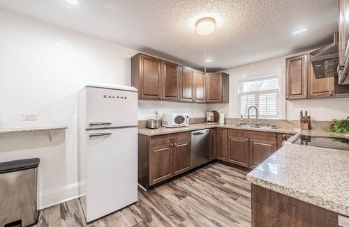 Dixieland House | Charming Historic Blue Bungalow