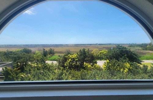 Ocracoke House | Contentment: Spacious home, den, screened porch, marsh views.