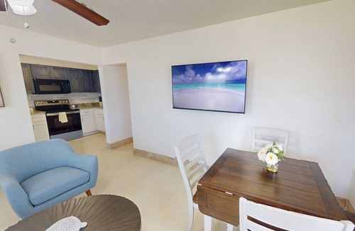 Treasure Island Condo | Cozy 1BR “Bayside” Retreat Steps from Beach, Walk to John’s Pass, Deck, +Tickets to Fun Activities!