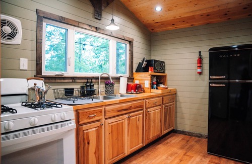 Central Cottage | Cozy Bunk House Cottage near Clemson - full kitchen, large deck, grill, and more