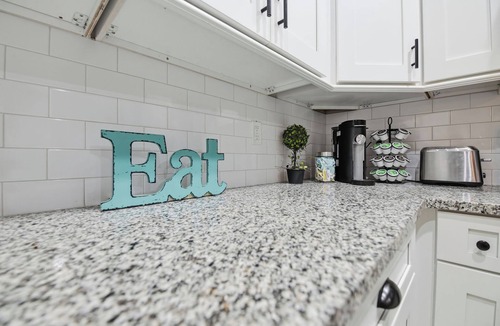St. Augustine House | Cozy Coastal Retreat w/Fire Pit Grill Outdoor Games Family & Pet Friendly