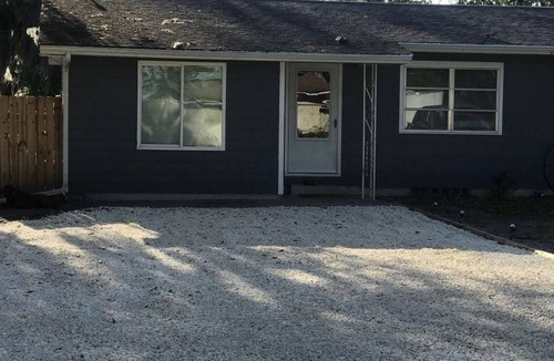 Inverness House | Cozy Oasis nestled on 2 acres w pool and lake views