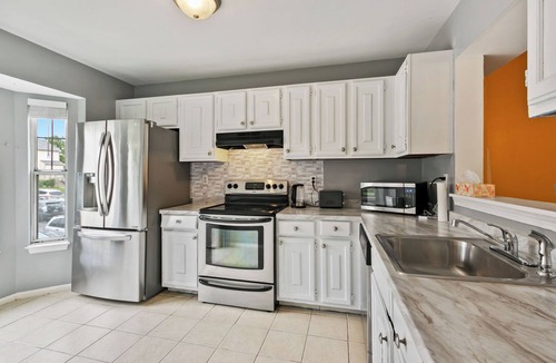 Calverton House | Cozy & Tranquil Getaway: Deck, Yard, Free Parking!