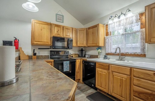 St. Anthony House | Cozy Waterfront Retreat with Hot Tub in St. Anthony