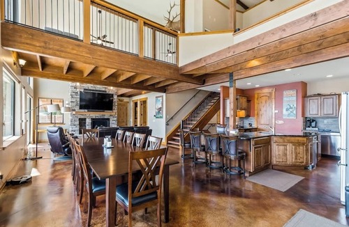 Laclede House | Custom riverfront home with private dock, game room, hot tub & heated floors