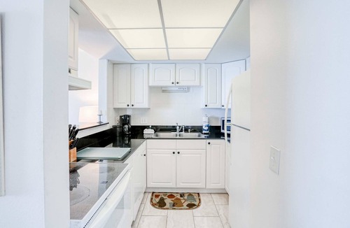 Indian Shores Condo | Delightful waterfront condo with sweeping views beach access balcony and pool