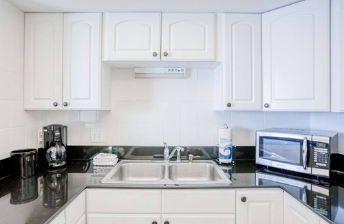 Indian Shores Condo | Delightful waterfront condo with sweeping views beach access balcony and pool