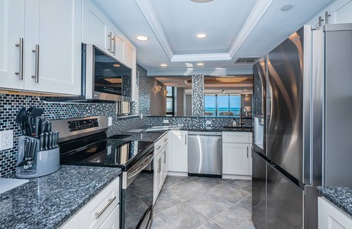 Sand Key Condo | Direct Gulf Front Southern Exposure corner unit with TWO BALCONIES! UNOBSTRUCTED Breathtaking Million Dollar Views & Magnificent Sunsets! Located in Lighthouse Towers, Clearwater Beach ~