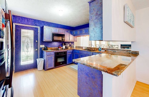 Thomas Drive House | Dog-friendly vibrant home with jetted tub - 2 miles to beach