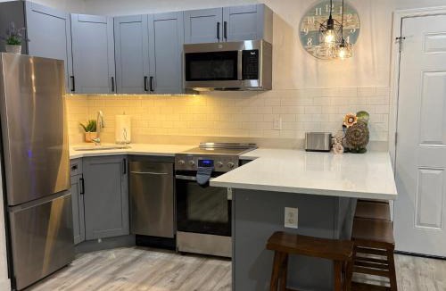 Historic Uptown Apartment | Downtown Oasis - One Bedroom Private Bungalow