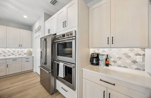 American Beach House | Endless Summer | Brand New Oceanfront Beach House | Hot Tub | Elevator | EV Charger | Sleeps 17