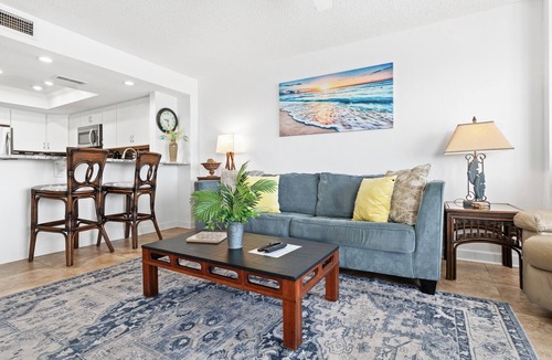 Daytona Beach Shores Condo | Enjoy stunning ocean views from the balcony, living room, dining area, and kitchen. This 2BR condo features a heated beachfront pool, fitness room, king beds in both bedrooms, and comfortably sleeps 4 in beautiful Daytona Shores.