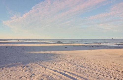 Redington Shores Apartment | Enjoy the Sunset at Amber Cove, Just Steps to the Beach!