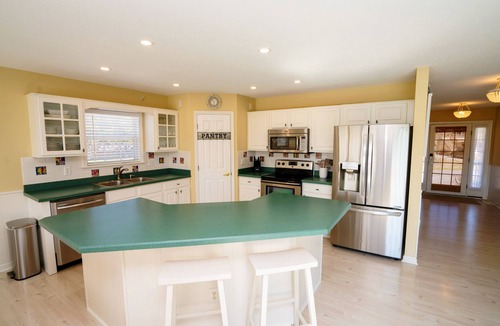 Sea Scape House | Entire home in Kitty Hawk, NC. Pool, hot tub, & spacious backyard!