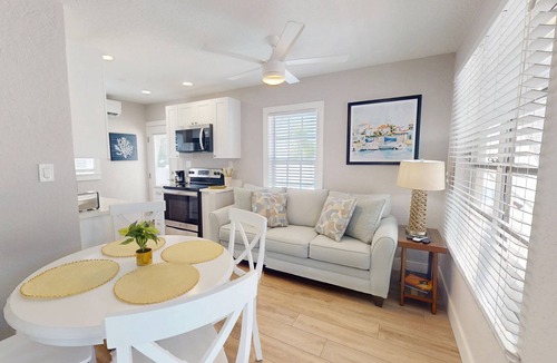 Madeira Beach Cottage | Entire Island Paradise Cottages – Heated Pool, Tiki Hut, Walk to Beach, 8 Units, Sleeps 30