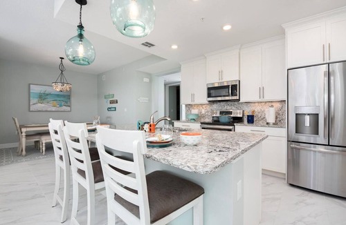 Whitney Beach Condo | Exclusive Anna Maria Sound Waterfront Retreat with Shared Pool & Sunset Serenity