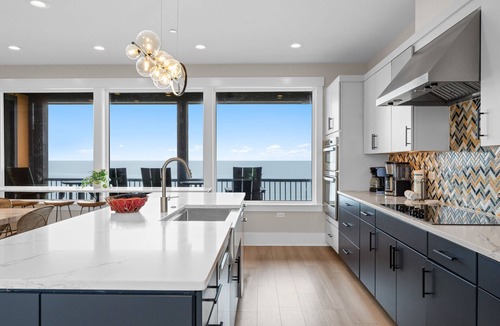 Oak Island House | Experience luxury at the Black Pearl, an oceanfront home in Oak Island with 11 bedrooms.