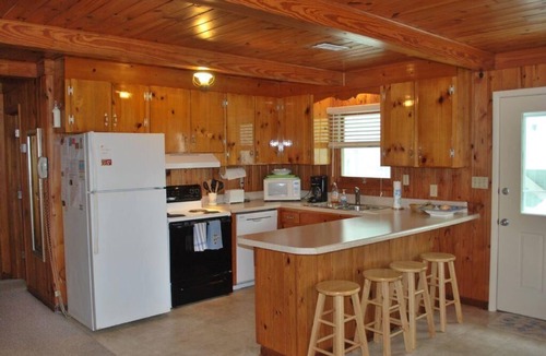 Holden Beach Cottage | Experience oceanfront bliss at The Lee Cottage in Holden Beach, NC, perfect for 6 guests.