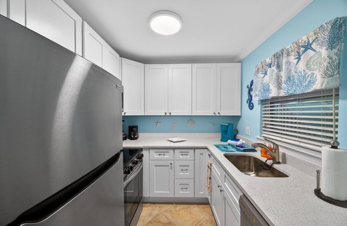 Indian Shores Condo | FIRST FLOOR! DIRECT"WATERFRONT" Newly Renovated! Walk to Beach! King Bed