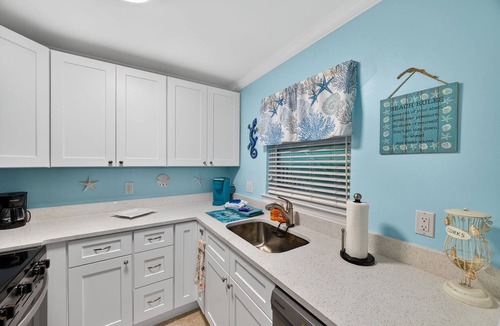 Indian Shores Condo | FIRST FLOOR! DIRECT"WATERFRONT" Newly Renovated! Walk to Beach! King Bed