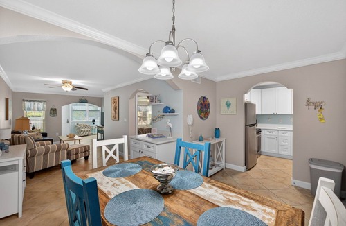 Indian Shores Condo | FIRST FLOOR! DIRECT"WATERFRONT" Newly Renovated! Walk to Beach! King Bed