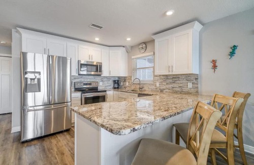 Indian Shores House | Four Shores Unit 1 Beach Condo Direct Gulf with Pool & Spa