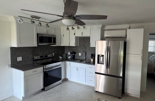 St. Pete Beach Condo | Fully Renovated Waterfront Views Walk to Beach