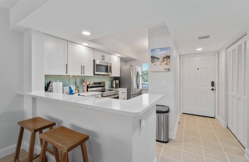 Plantation Condo | Golf and Country Club privileges! Heated Pool near Wellen Park & Braves Stadium