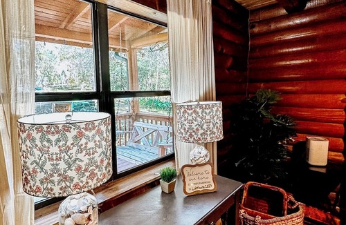 Floral City Cabin | Gorgeous and peaceful 4-bedroom cabin with wooded landscape and gated entry.