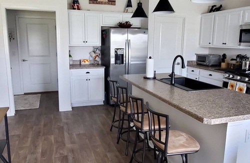 Wildwood House | Great Location to all the fun! Three bedroom Designer home with Golf Cart.
