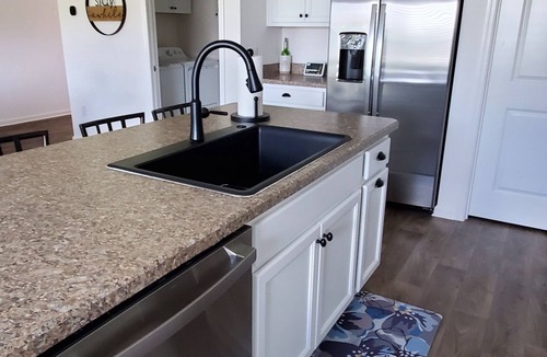 Wildwood House | Great Location to all the fun! Three bedroom Designer home with Golf Cart.
