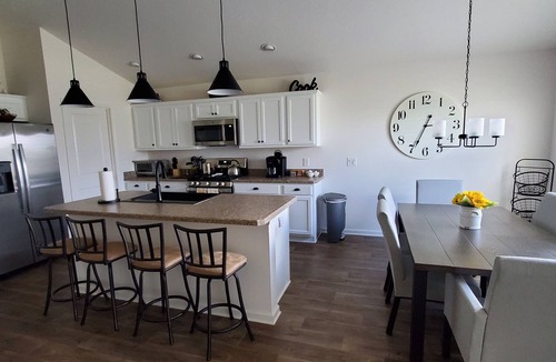 Wildwood House | Great Location to all the fun! Three bedroom Designer home with Golf Cart.