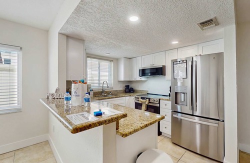 St. Pete Beach Condo | Ground floor getaway with a heated pool and central AC walk to the beach