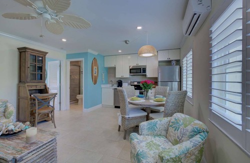 Siesta Key Village Condo | Heart of Siesta Key Village, Walk to Beach, Heated Pool, Comes with Beach Gear!