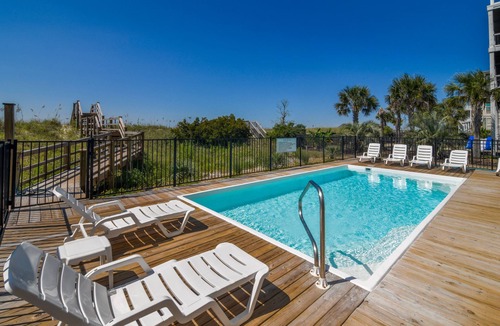 Holden Beach House | Hobbs Realty - "Coast is Clear," an oceanfront home with a heatable pool, hot tub, and elevator.